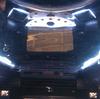 Display of mirrored ceiling, lights, and speakers in Ford Party Bus
