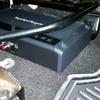 Amplifier mounted under truck seat