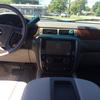 Full display of steering wheel and Alpine receiver in-dash install in Chevrolet Avalanche