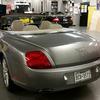 Rear view of custom gray convertible Bentley GT Continental